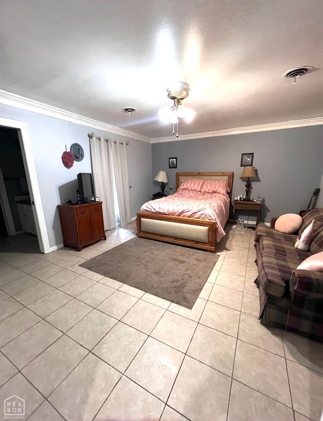 177 S Oak, Burdette, AR 72321 - bedroom featuring visible vents, baseboards, ceiling fan, crown molding, and light tile patterned flooring