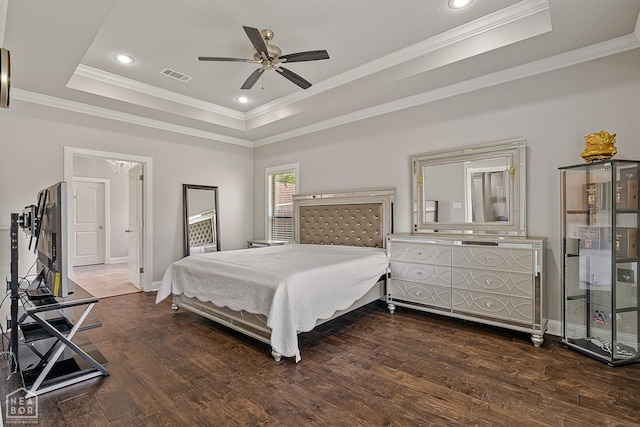 6605 Evan Cv, Jonesboro, AR 72404 - bedroom featuring a raised ceiling, wood finished floors, ornamental molding, recessed lighting, and baseboards