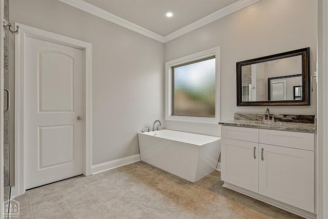 6605 Evan Cv, Jonesboro, AR 72404 - full bath featuring crown molding, a soaking tub, vanity, recessed lighting, and baseboards