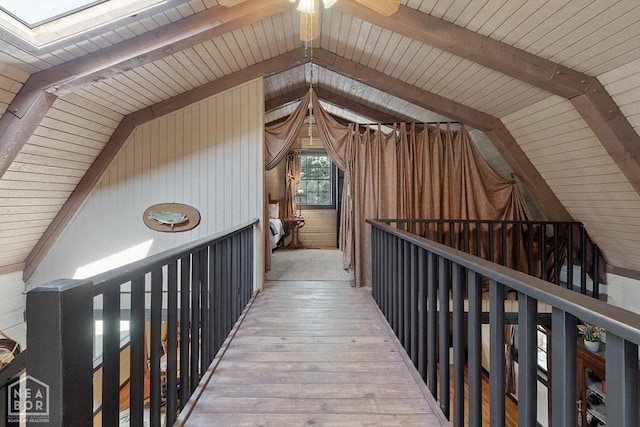 2 Star Falls Ln, Cherokee Village, AR 72529 - hall with wood finished floors, wooden walls, and vaulted ceiling with beams