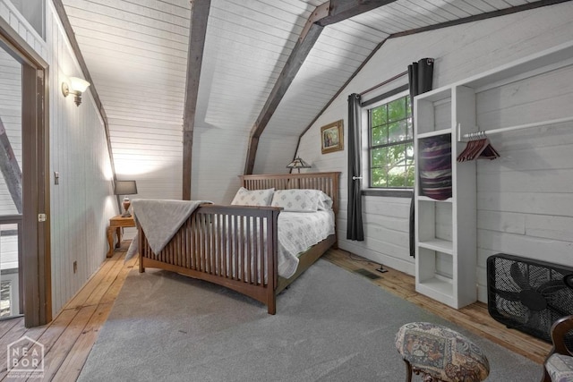 2 Star Falls Ln, Cherokee Village, AR 72529 - bedroom with hardwood / wood-style floors, wood walls, and vaulted ceiling with beams