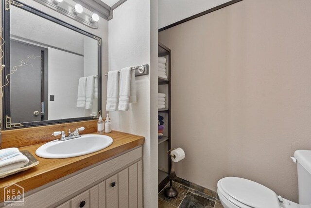 2 Star Falls Ln, Cherokee Village, AR 72529 - half bathroom with toilet, vanity, and baseboards
