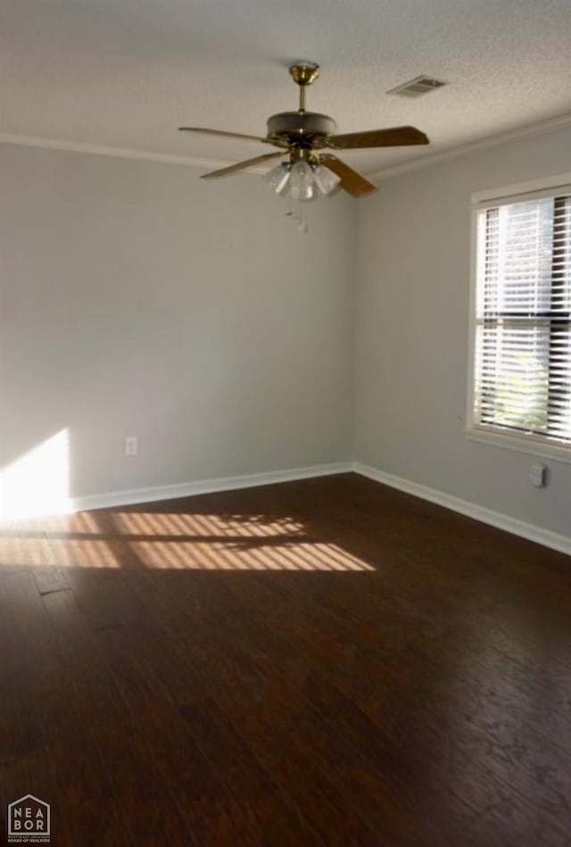 3426 Aggie Rd, Jonesboro, AR 72405 - unfurnished room featuring wood finished floors, ceiling fan, baseboards, and crown molding