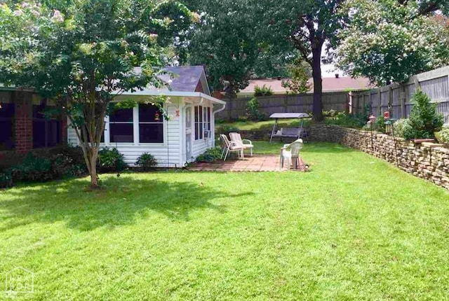 3426 Aggie Rd, Jonesboro, AR 72405 - view of yard with a patio