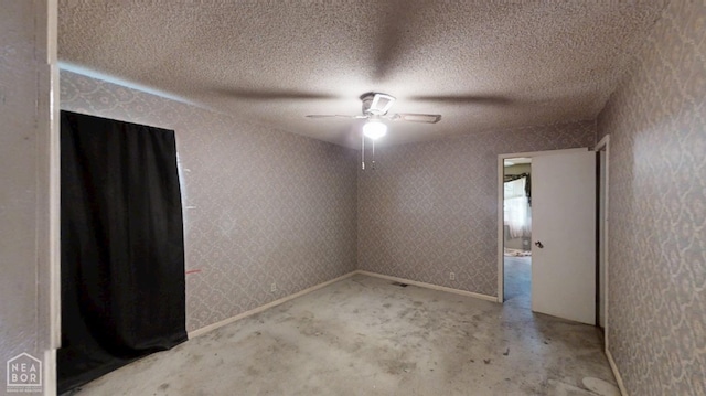 819 Northgate Dr, Osceola, AR 72370 - spare room with ceiling fan and a textured ceiling