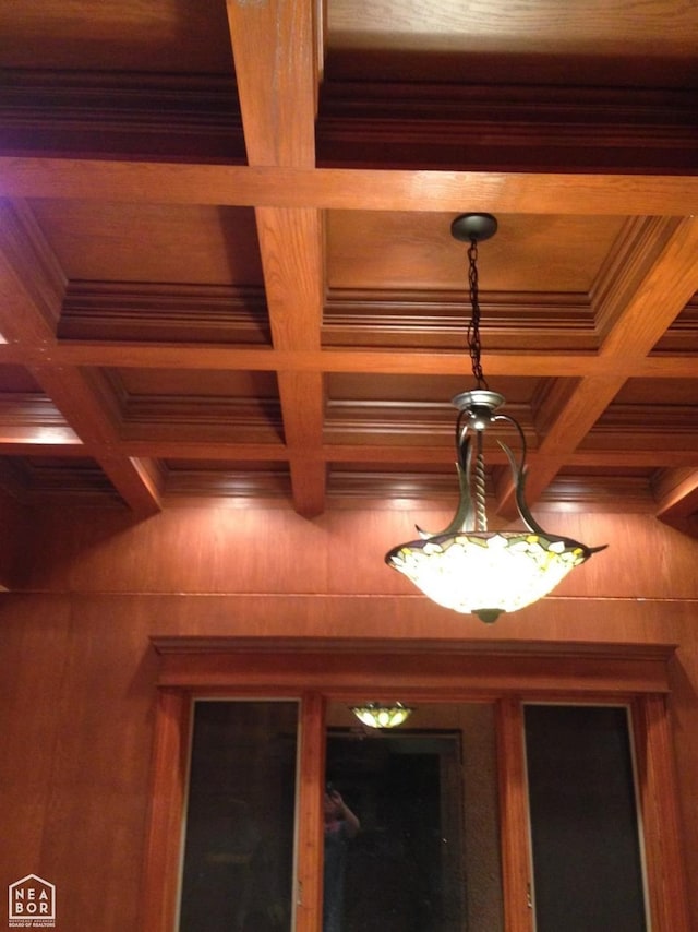  - interior details with wood walls, wooden ceiling, and coffered ceiling