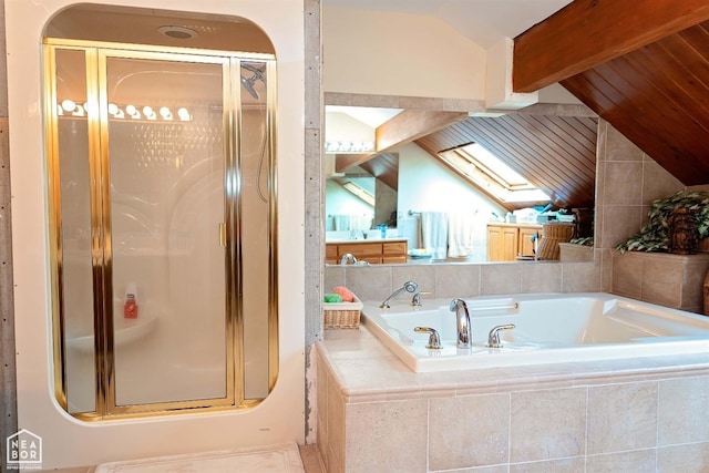  - full bath featuring a stall shower, a garden tub, and vaulted ceiling