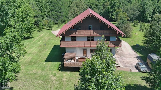  - drone / aerial view featuring a view of trees