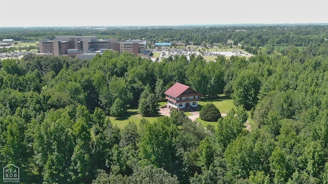  - drone / aerial view with a view of trees