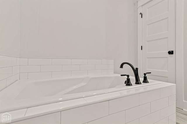 bathroom featuring a garden tub
