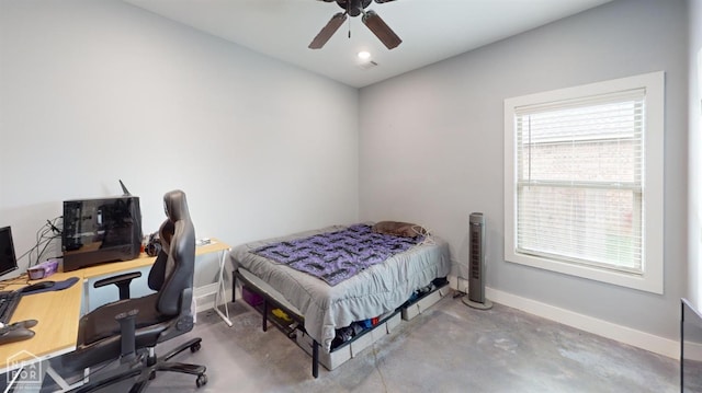 118 E Hills Dr, Bono, AR 72416 - bedroom featuring a desk, concrete floors, and ceiling fan