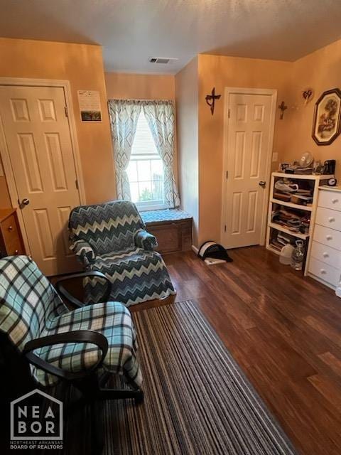 living area featuring dark wood finished floors