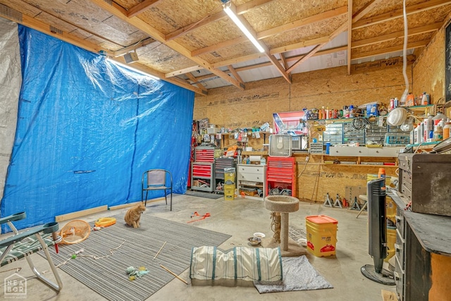 misc room with concrete flooring
