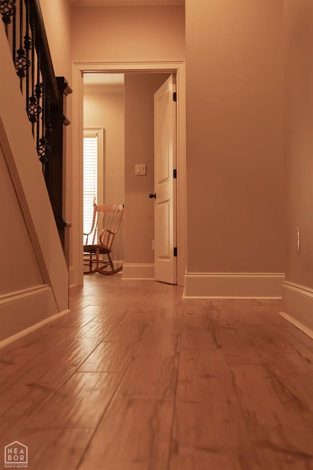 corridor featuring baseboards