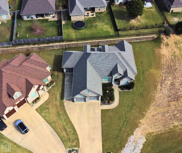 birds eye view of property with a residential view