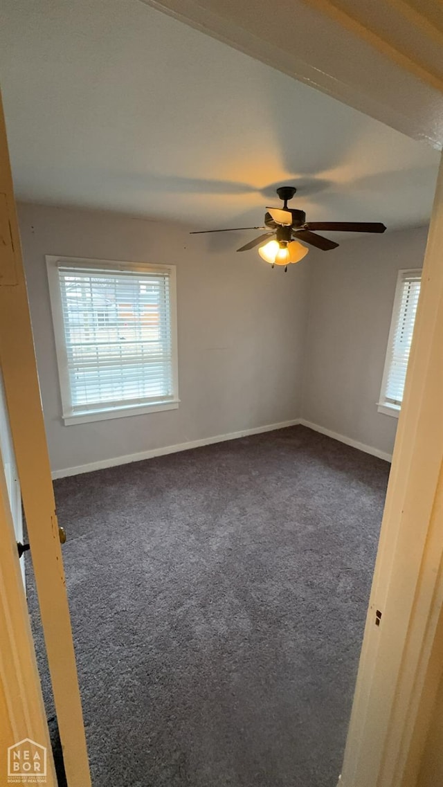 621 W Thomas Ave, Jonesboro, AR 72401 - carpeted empty room with ceiling fan and baseboards