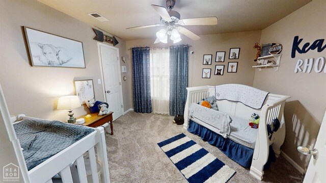 bedroom featuring visible vents, ceiling fan, baseboards, and carpet floors