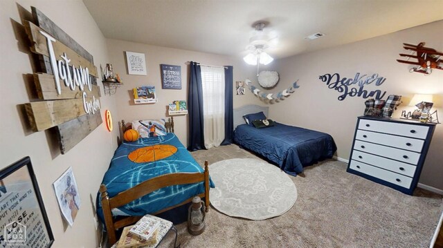 bedroom featuring visible vents and carpet