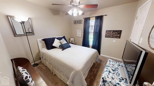 bedroom featuring ceiling fan, carpet flooring, and baseboards