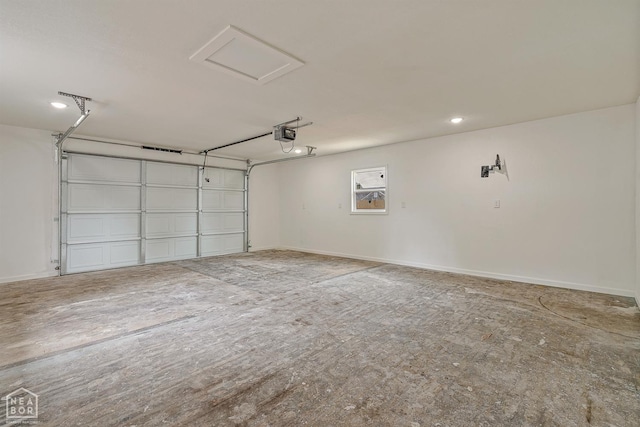 617 S 7th St, Paragould, AR 72450 - garage with a garage door opener and baseboards