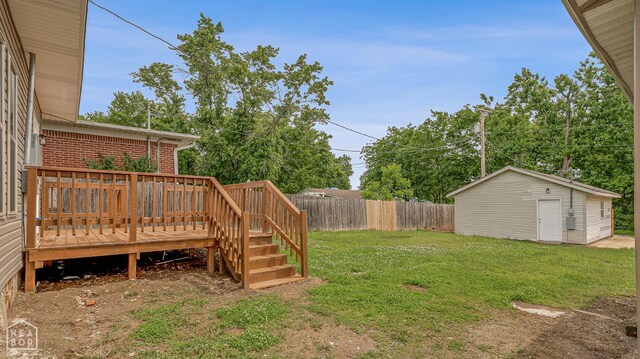 617 S 7th St, Paragould, AR 72450 - view of yard featuring a deck and an outdoor structure