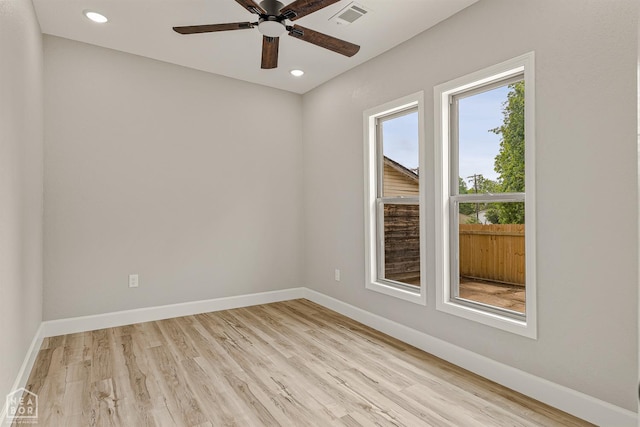617 S 7th St, Paragould, AR 72450 - unfurnished room with a ceiling fan, light wood-type flooring, recessed lighting, and baseboards
