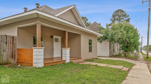 617 S 7th St, Paragould, AR 72450 - view of front facade featuring a porch and a shingled roof