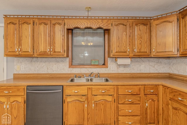 kitchen with light countertops, brown cabinetry, a sink, and dishwasher
