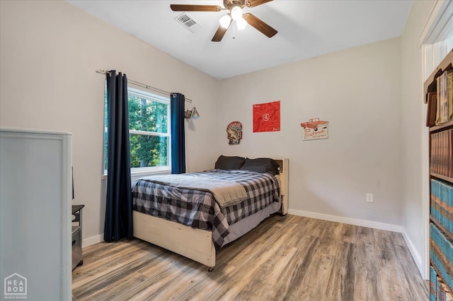 200 Law 296 Rd, Black Rock, AR 72415 - bedroom with wood finished floors and a ceiling fan