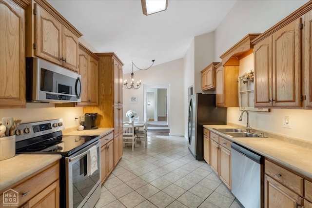 200 Law 296 Rd, Black Rock, AR 72415 - kitchen with stainless steel appliances, light countertops, a chandelier, vaulted ceiling, and light tile patterned flooring