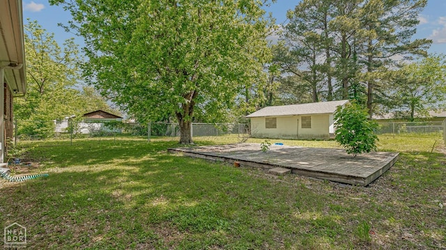 view of yard with a deck