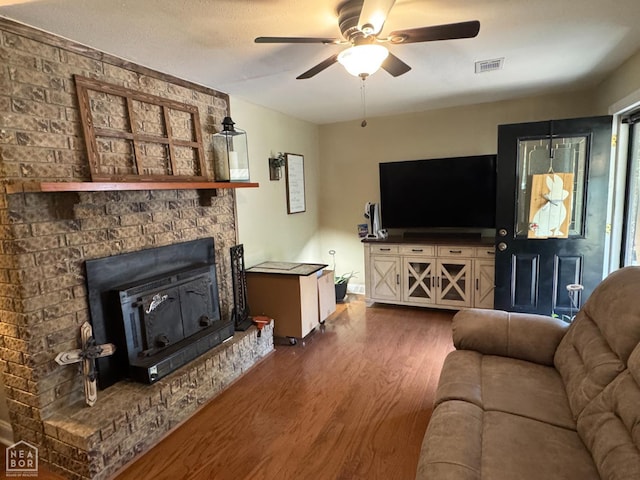 900 Sycamore Cv, Jonesboro, AR 72404 - living room featuring dark wood-style floors and a ceiling fan