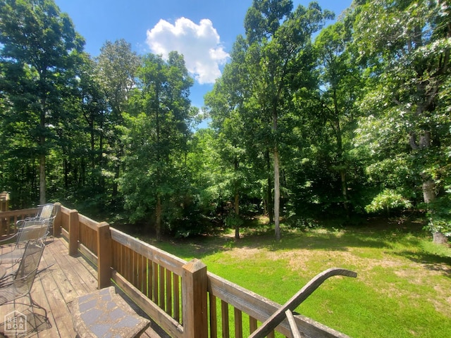 2590 W N St, Piggott, AR 72454 - deck featuring a yard