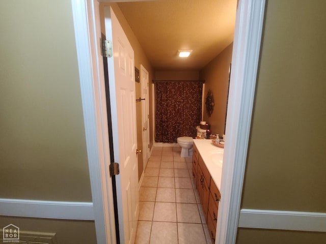 2590 W N St, Piggott, AR 72454 - full bath featuring tile patterned floors, vanity, and a shower
