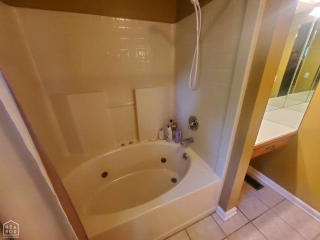 2590 W N St, Piggott, AR 72454 - full bath with tile patterned floors and tub / shower combination
