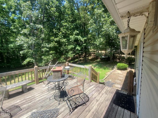2590 W N St, Piggott, AR 72454 - deck featuring a yard
