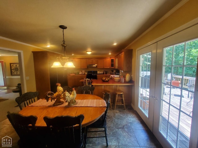 2590 W N St, Piggott, AR 72454 - dining room with french doors and ornamental molding