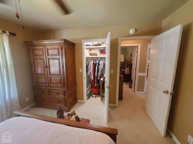 2590 W N St, Piggott, AR 72454 - bedroom with a walk in closet and light colored carpet