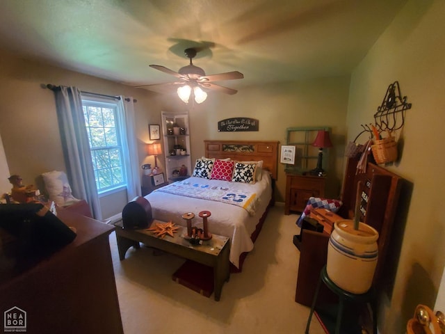 2590 W N St, Piggott, AR 72454 - bedroom with light carpet and ceiling fan