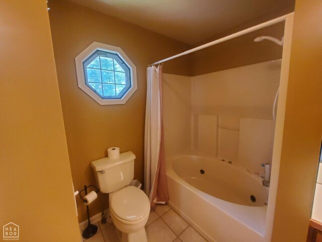 2590 W N St, Piggott, AR 72454 - full bath with tile patterned flooring and shower / bath combo