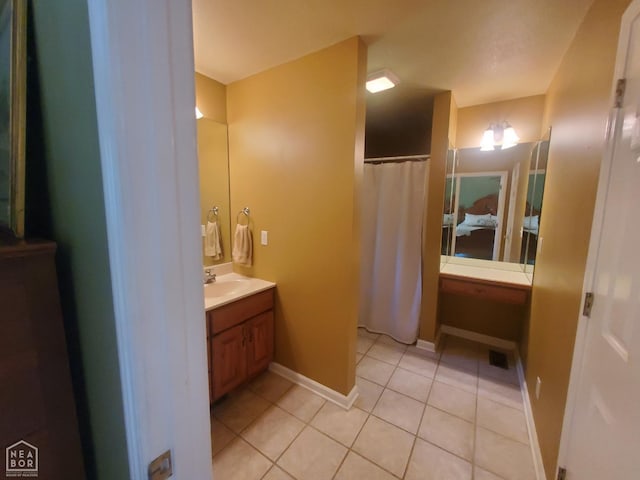 2590 W N St, Piggott, AR 72454 - full bath featuring vanity, tile patterned floors, and curtained shower