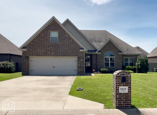 6509 Merrell Dr, Jonesboro, AR 72404 - traditional-style home featuring brick siding, a front lawn, concrete driveway, and a garage