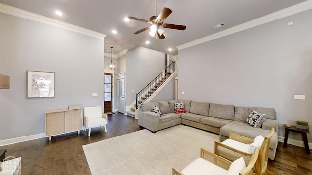 6509 Merrell Dr, Jonesboro, AR 72404 - living room featuring stairs, dark wood finished floors, crown molding, recessed lighting, and baseboards