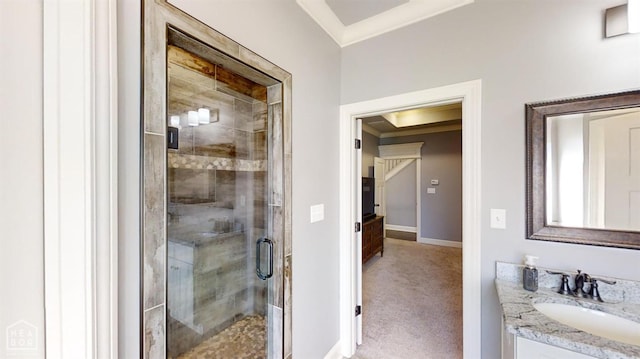 6509 Merrell Dr, Jonesboro, AR 72404 - bathroom with vanity, a shower stall, crown molding, and baseboards