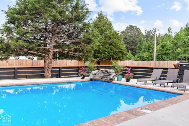 view of pool with a fenced backyard and a fenced in pool