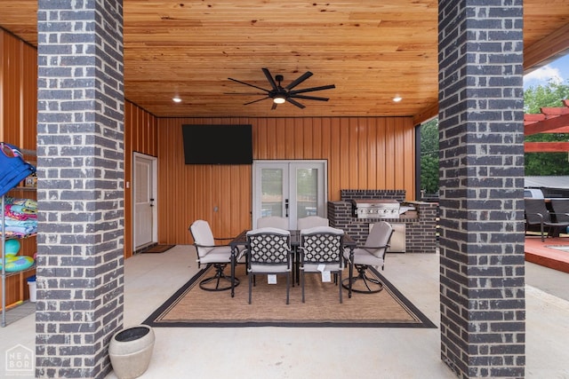 view of patio featuring french doors, ceiling fan, and outdoor dining space