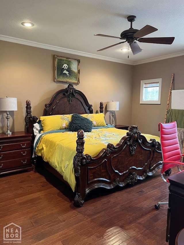 bedroom with crown molding, a ceiling fan, and hardwood / wood-style floors