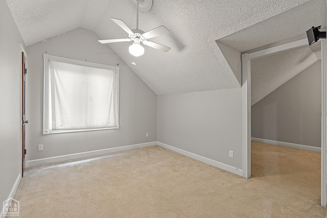2203 Rankin Cir, Jonesboro, AR 72404 - additional living space with a textured ceiling, vaulted ceiling, a ceiling fan, carpet, and baseboards