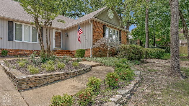 2203 Rankin Cir, Jonesboro, AR 72404 - property entrance with brick siding and roof with shingles