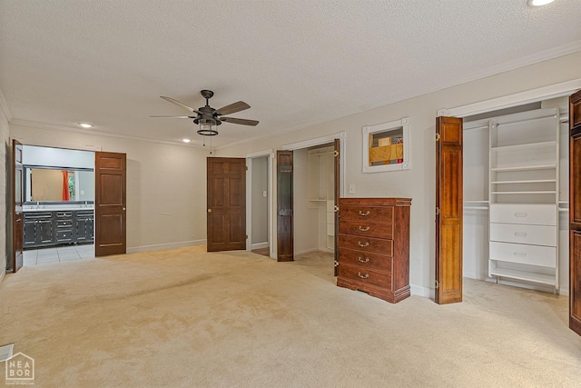 2203 Rankin Cir, Jonesboro, AR 72404 - unfurnished bedroom with ornamental molding, a textured ceiling, light carpet, baseboards, and recessed lighting